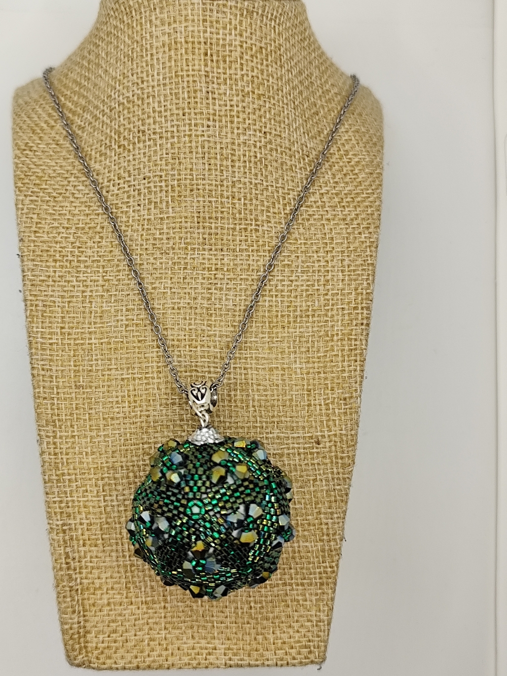 Silver Necklace with Green Crystal Orb Pendant
